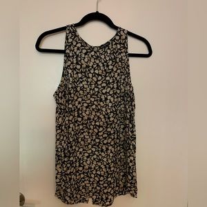 Sleeveless floral back white blouse